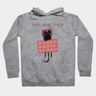 Cartoon funny black cat and the inscription "Insert coffee to begin". Hoodie